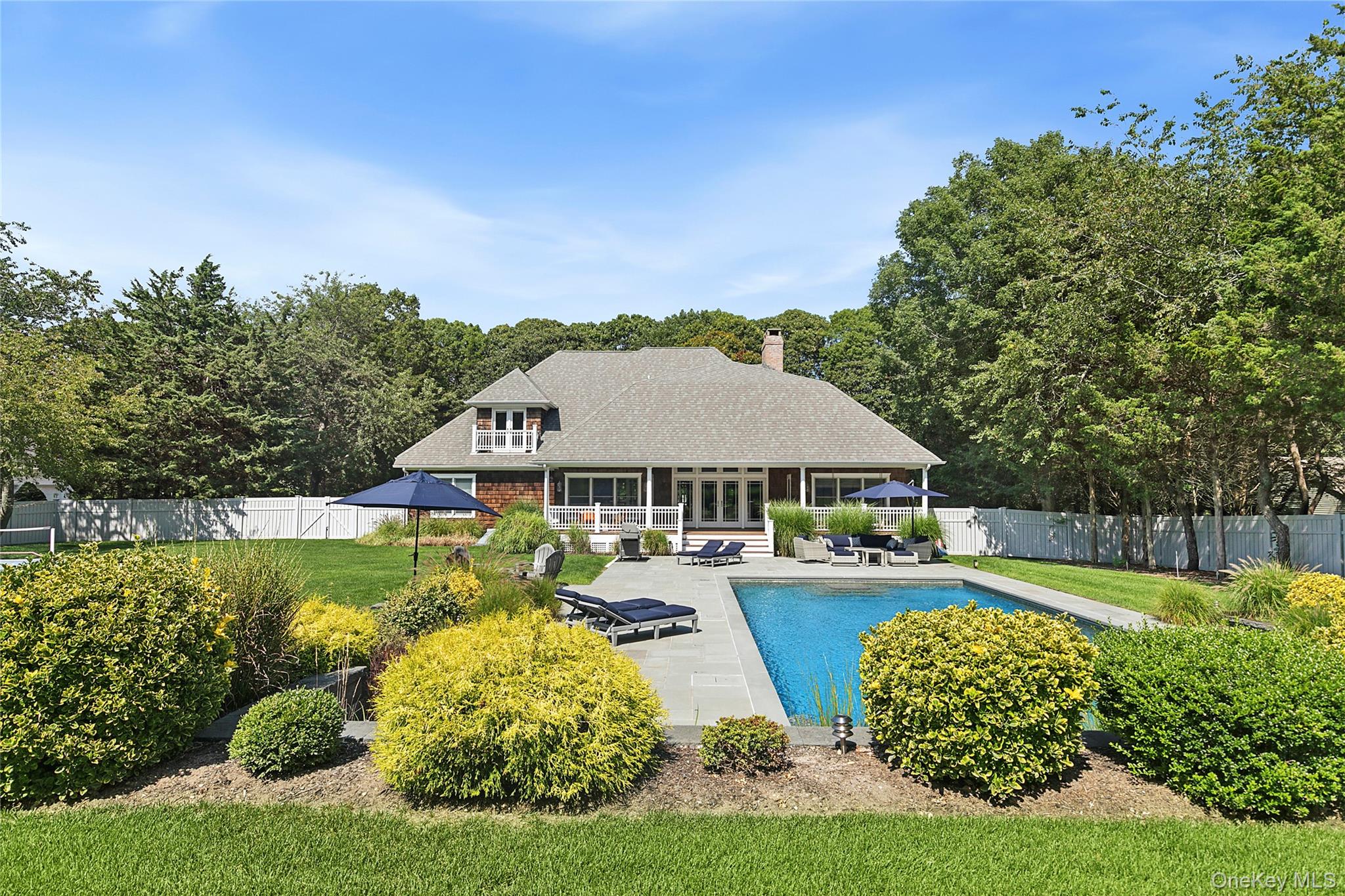 3470 North Bayview Road Southold, NY 11971 - Photo 17 of 25 View of swimming pool with a sunroom, a patio, and an outdoor hangout area