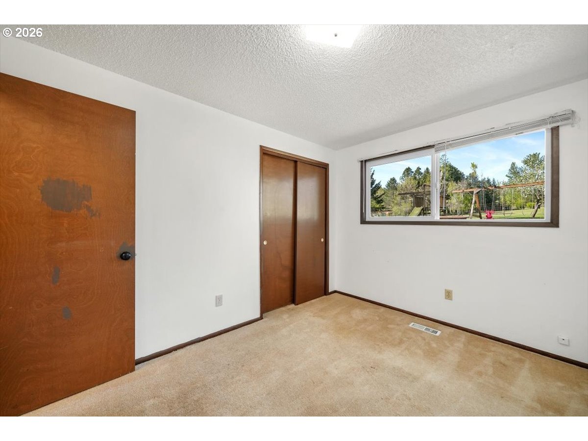 2035 Primrose Loop Philomath, OR 97370 - Photo 46 of 48 a view of empty room with window