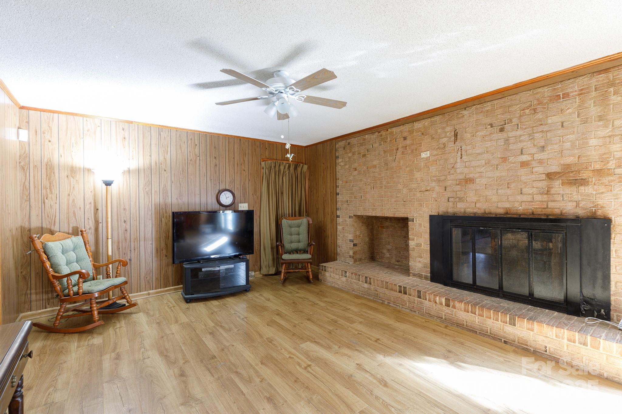 1626 Camp Creek Road Lancaster, SC 29720 - Photo 11 of 29 a living room with furniture and a fireplace