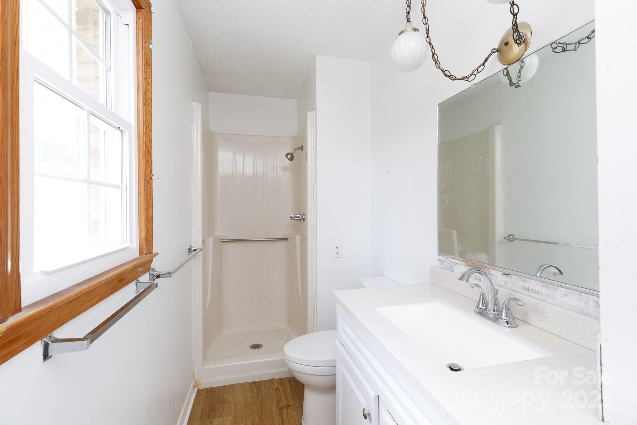 1626 Camp Creek Road Lancaster, SC 29720 - Photo 16 of 29 a bathroom with a sink toilet and shower