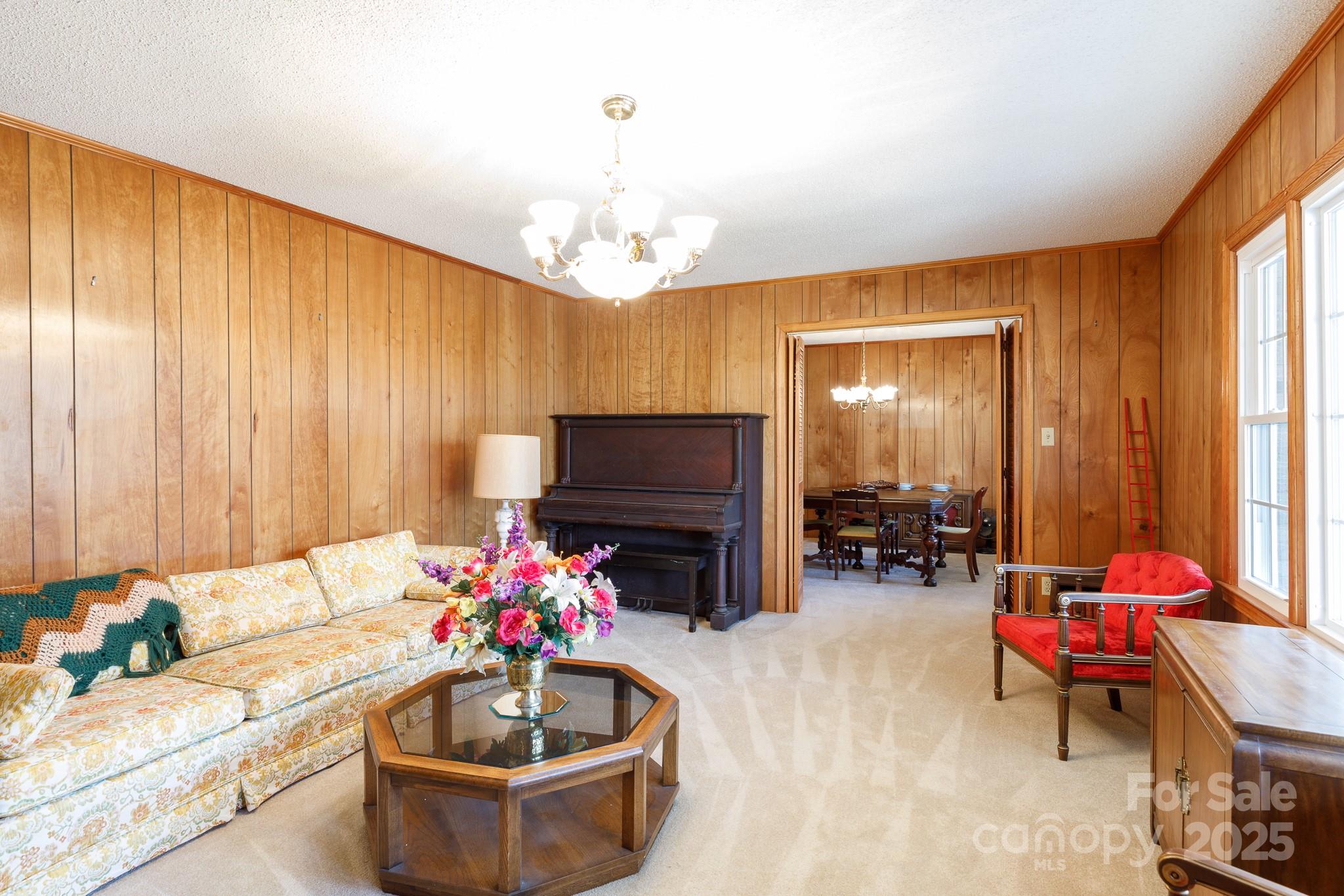 1626 Camp Creek Road Lancaster, SC 29720 - Photo 7 of 29 a living room with furniture a flat screen tv and a fireplace