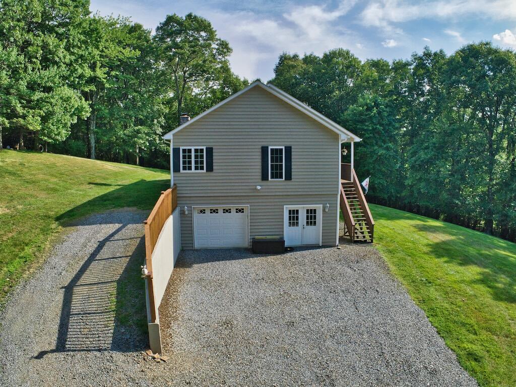 1577 Fairview Church Road Southwest Floyd, VA 24091 - Photo 3 of 32 a view of a house with a yard