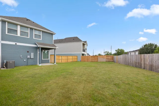 a house view with a garden space