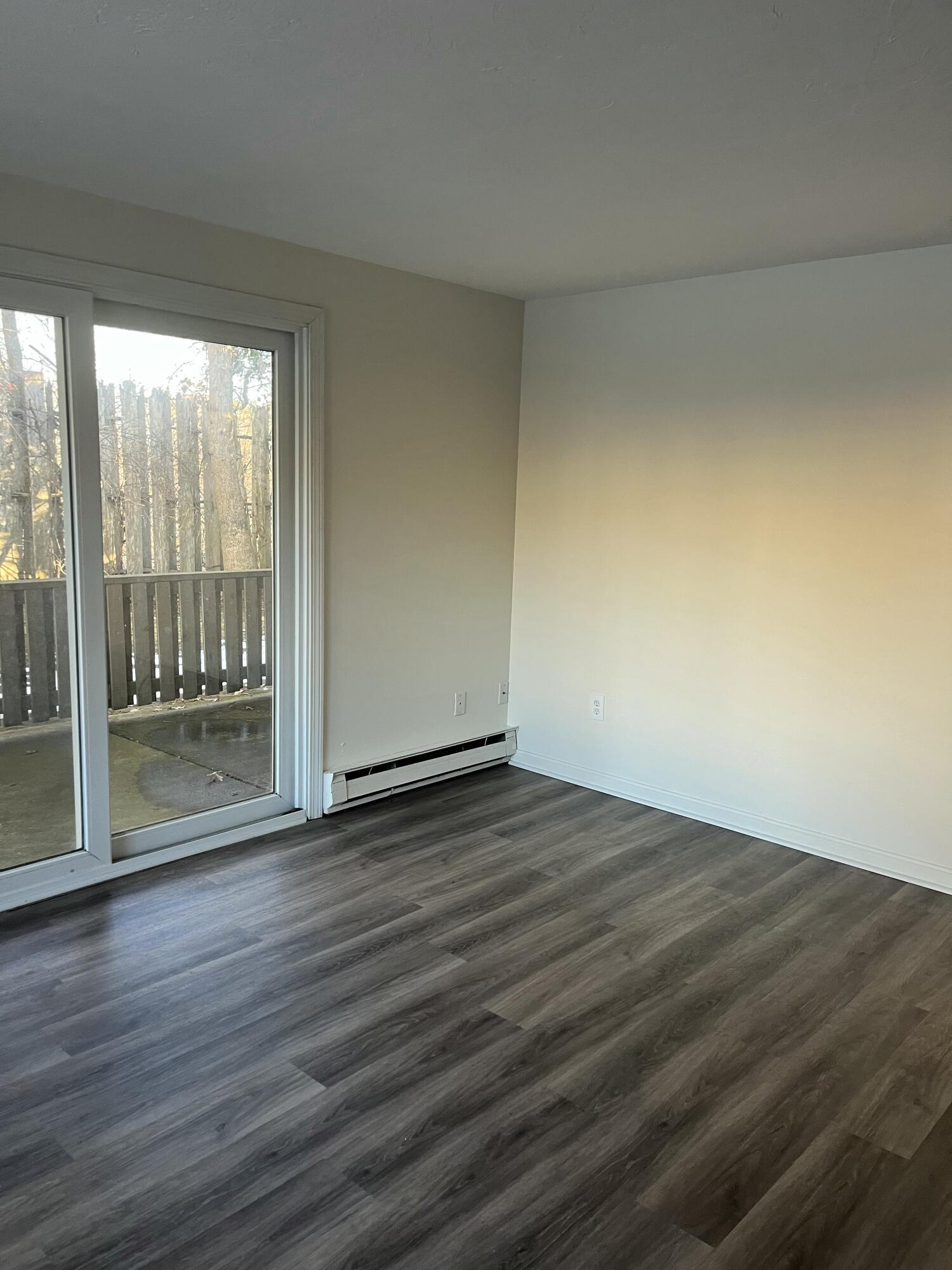 1029 Iyannough Road, Unit B BLDG 8 Hyannis, MA 02601 - Photo 4 of 14 a view of wooden floor and brick walls