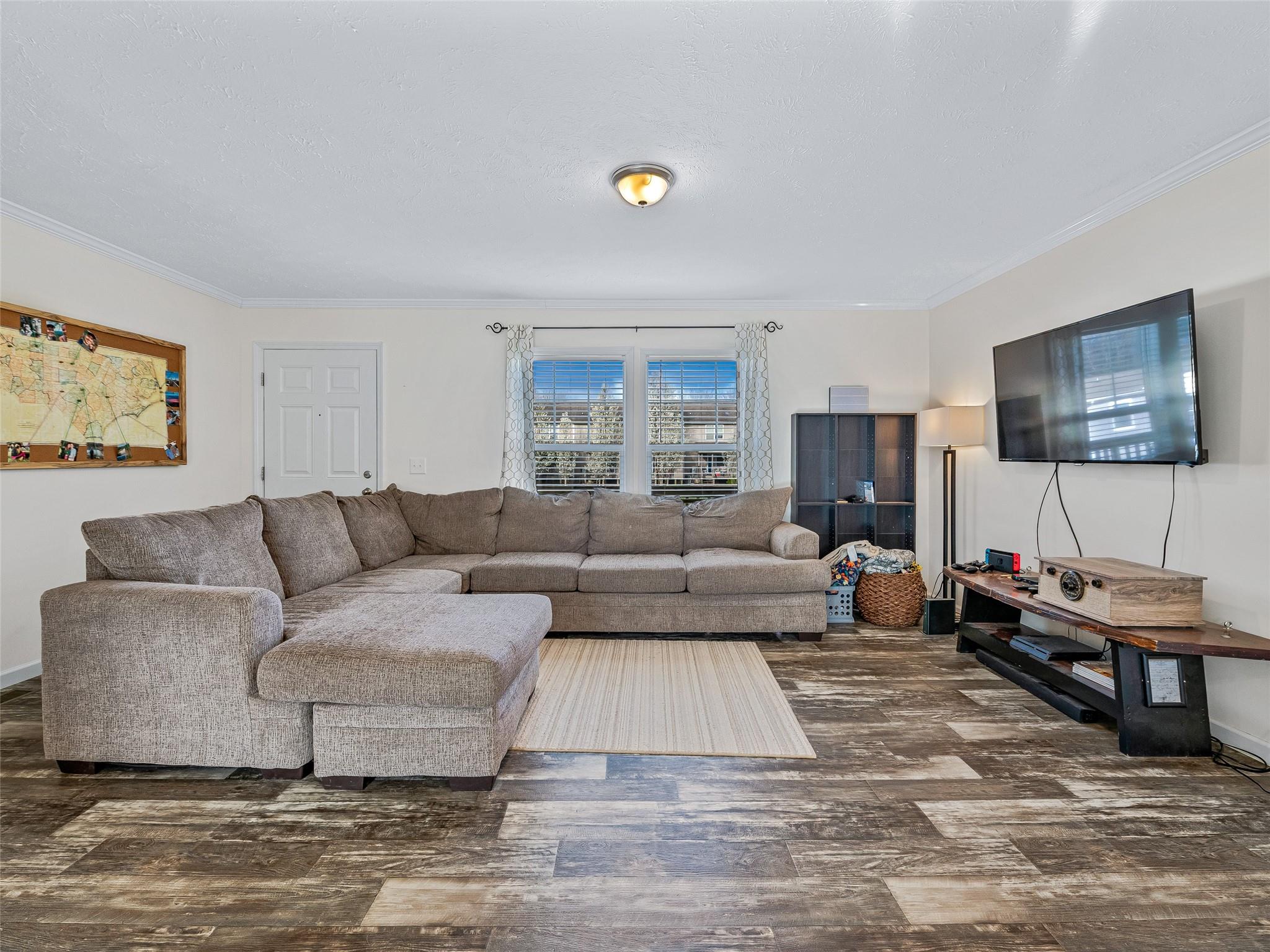 18 Souther Road Fletcher, NC 28732 - Photo 6 of 35 a living room with furniture and a flat screen tv