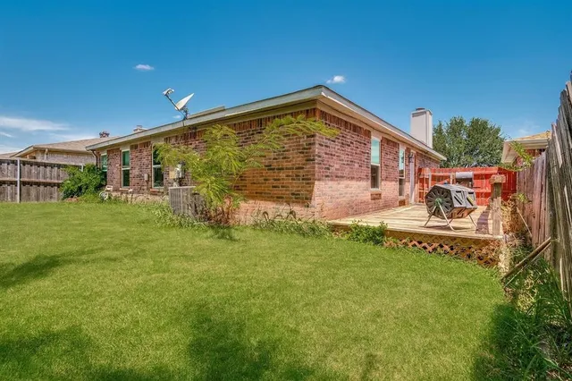 a front view of house with an outdoor space and seating
