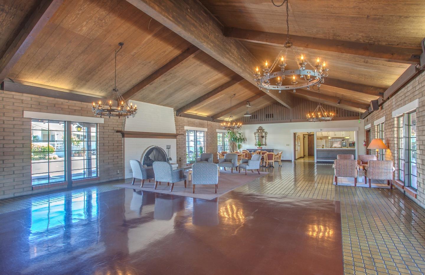 5450 Monterey Road, Unit 142 San Jose, CA 95111 - Photo 12 of 13 a view of a dining room with furniture a chandelier and wooden floor