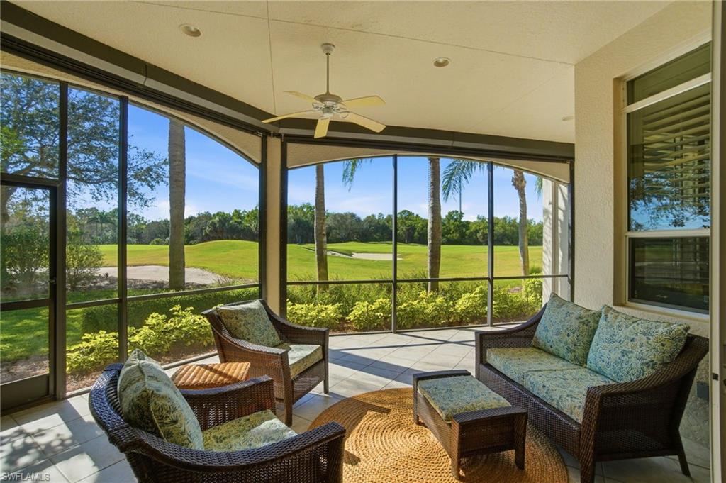 17015 Porta Vecchio Way, Unit 101 Naples, FL 34110 - Photo 1 of 39 a living room with couch and a window