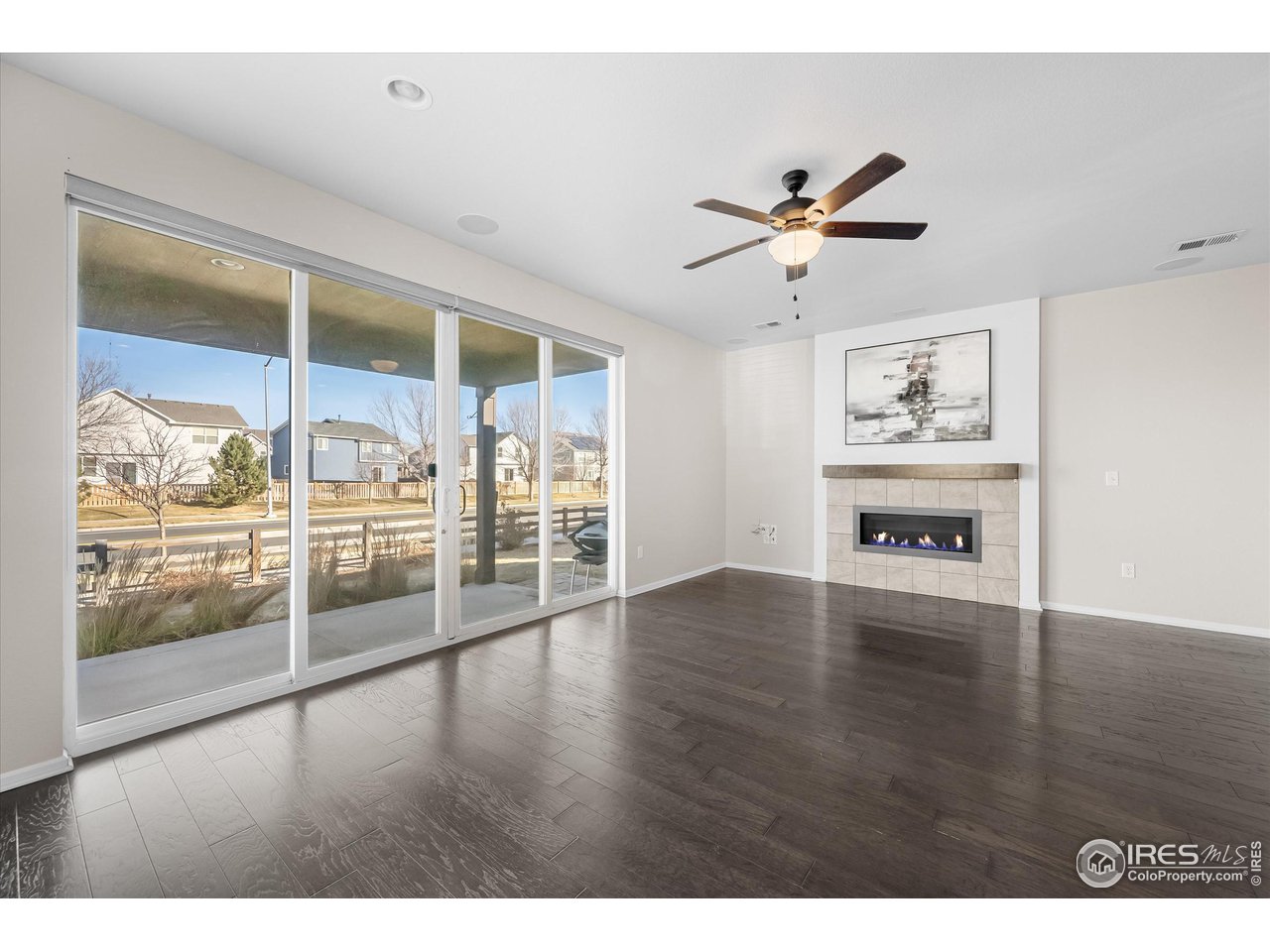 1604 Sorenson Drive Windsor, CO 80550 - Photo 15 of 32 a view interior of a house wooden floor and a ceiling fan