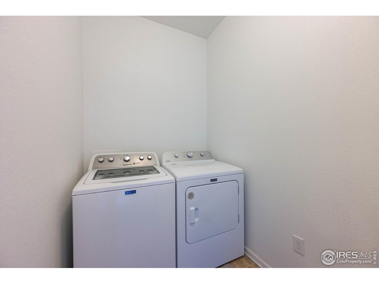 1604 Sorenson Drive Windsor, CO 80550 - Photo 19 of 32 a utility room with dryer and washer