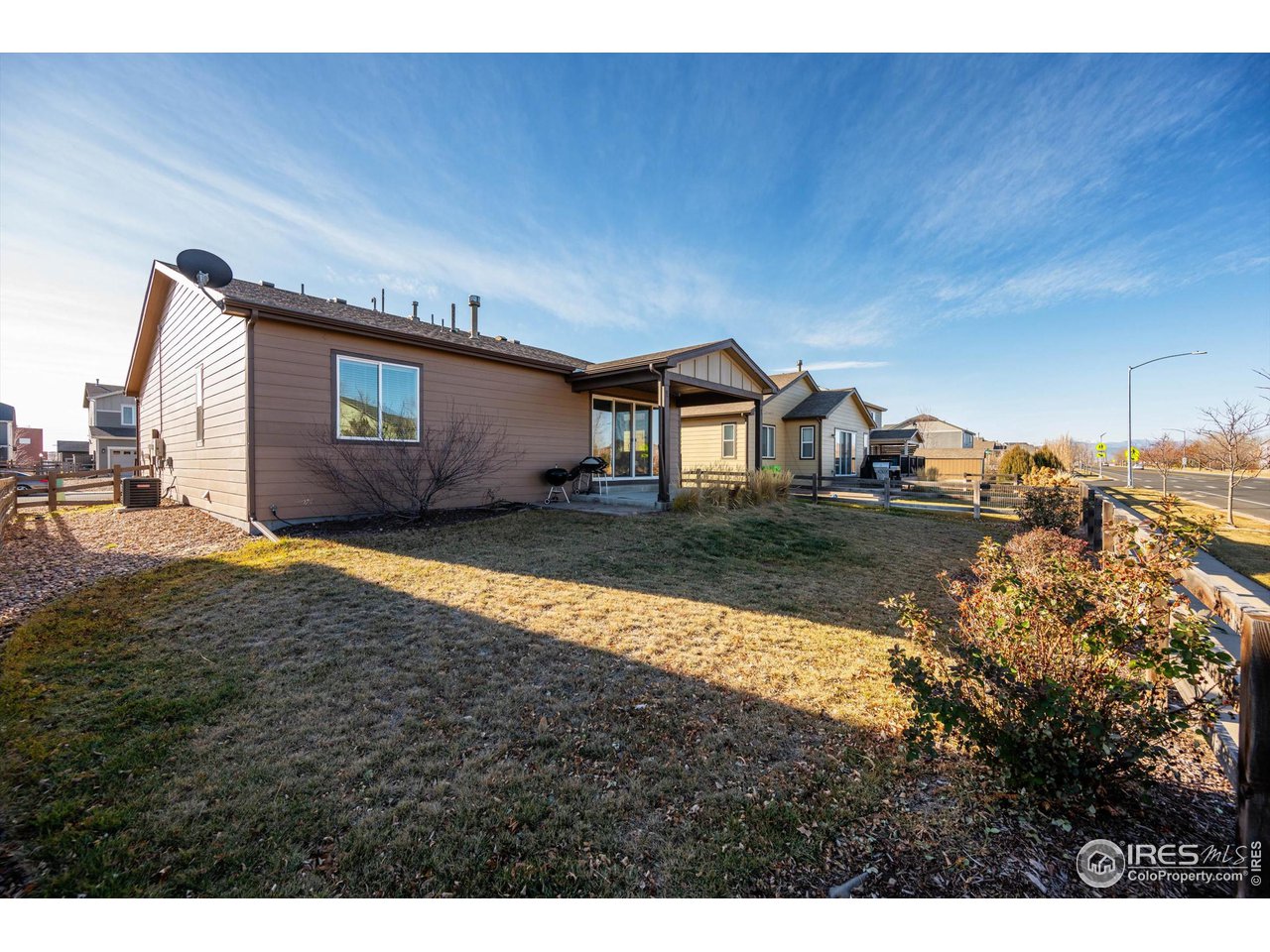 1604 Sorenson Drive Windsor, CO 80550 - Photo 30 of 32 a view of a house with a yard