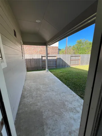a bathroom with a shower and toilet