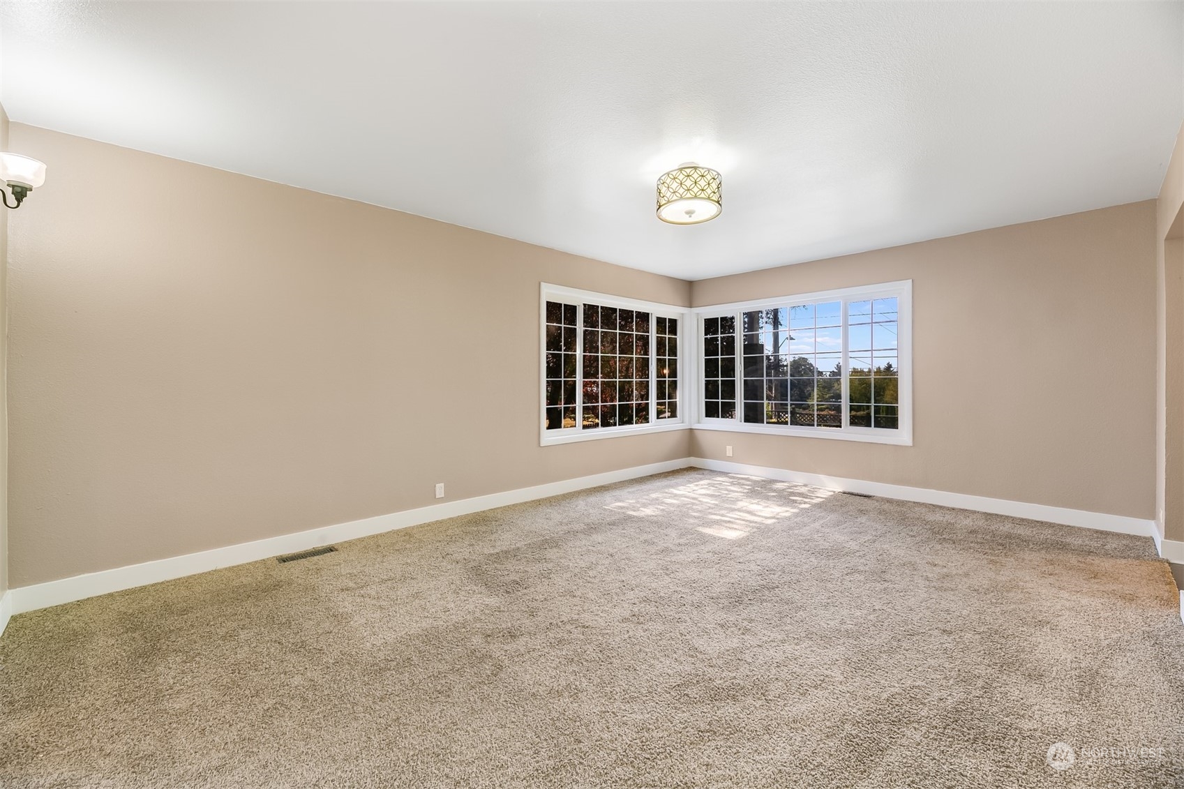 2528 Southwest 112th Street Seattle, WA 98146 - Photo 19 of 33 an empty room with windows