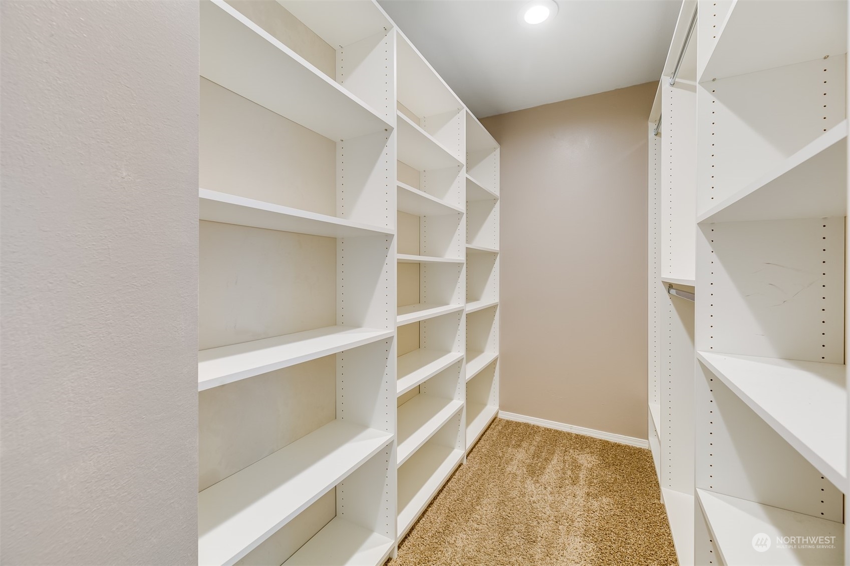 2528 Southwest 112th Street Seattle, WA 98146 - Photo 20 of 33 a view of walk in closet with empty racks