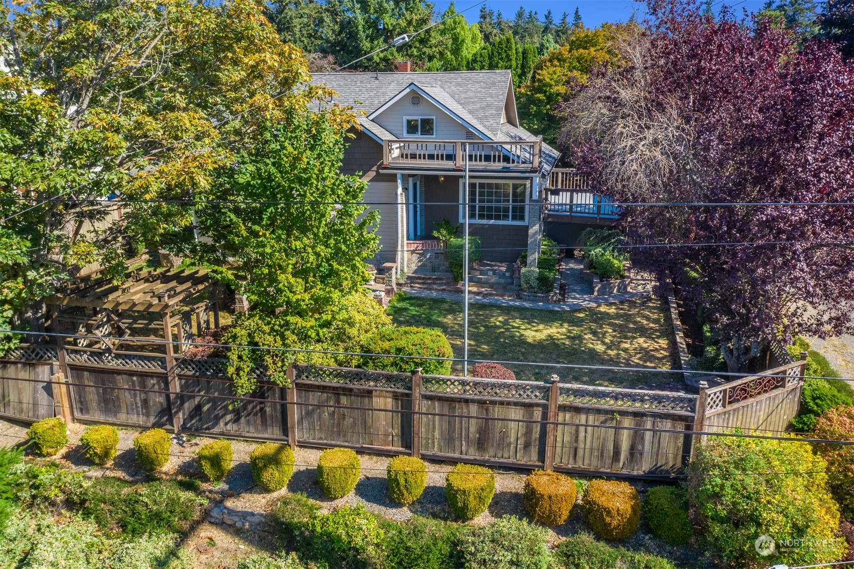 2528 Southwest 112th Street Seattle, WA 98146 - Photo 32 of 33 a view of swimming pool with lawn chairs and plants