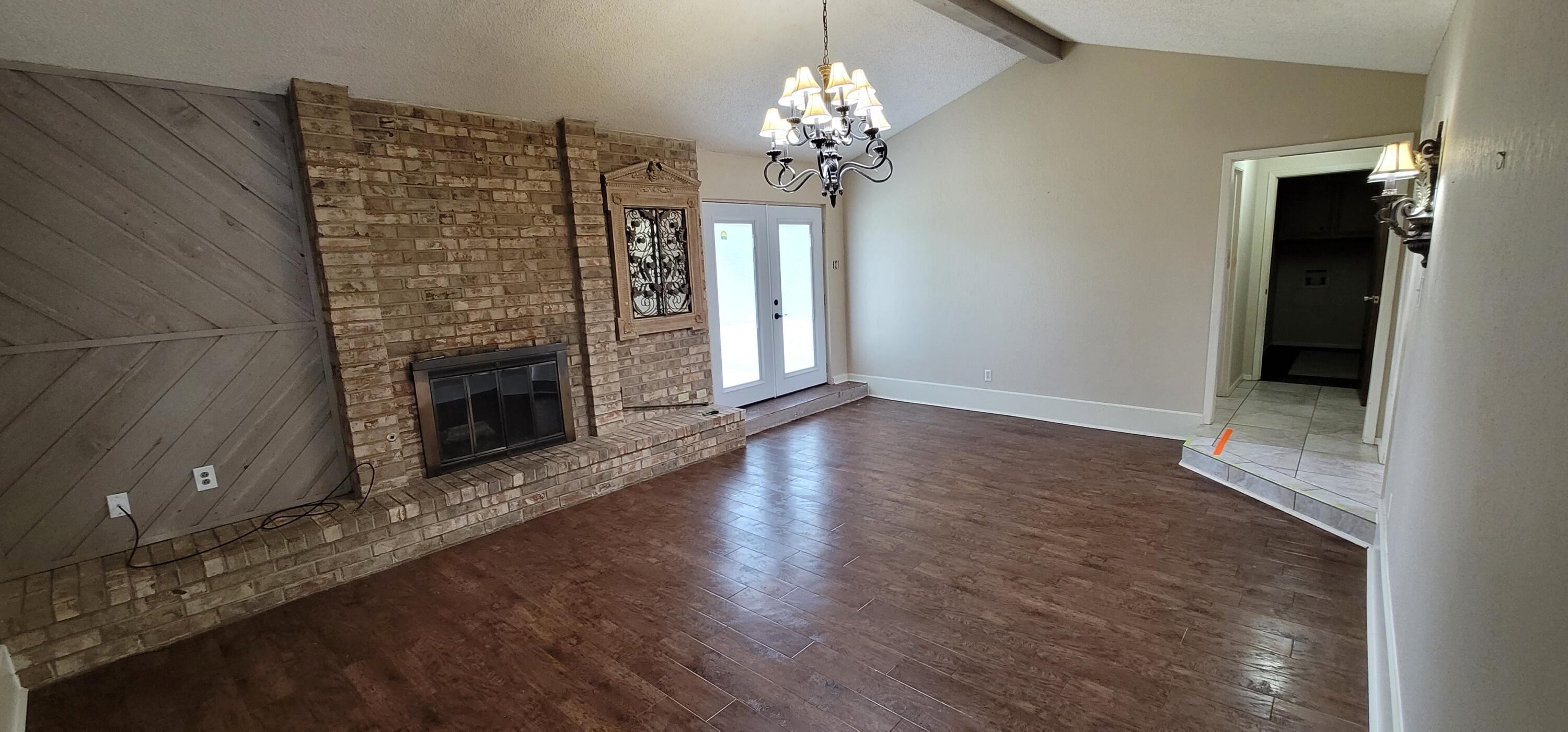 4803 73rd Street Lubbock, TX 79424 - Photo 13 of 32 Stunning Flooring & Fireplace Wall