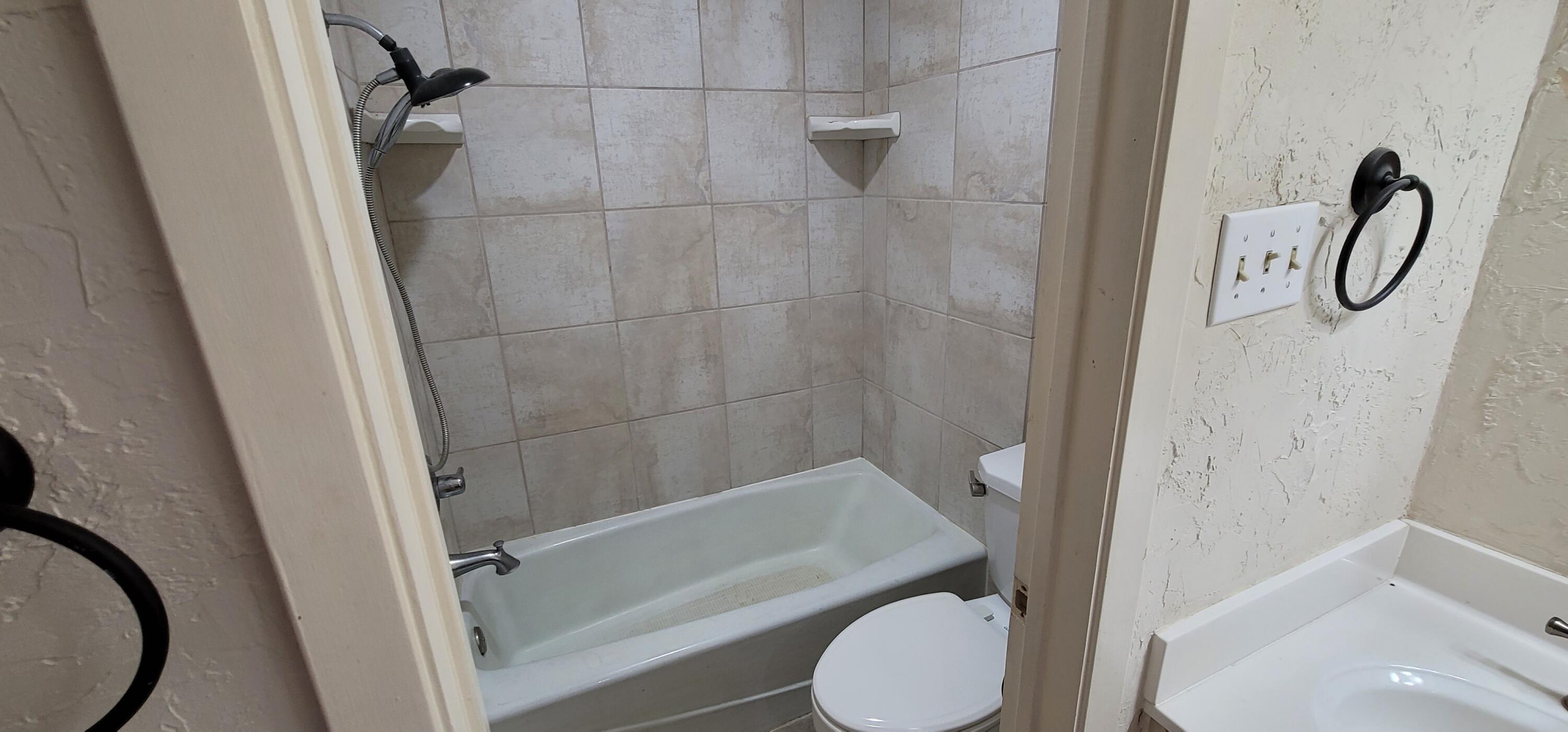 4803 73rd Street Lubbock, TX 79424 - Photo 20 of 32 Updated Shower over tub in Potty Room