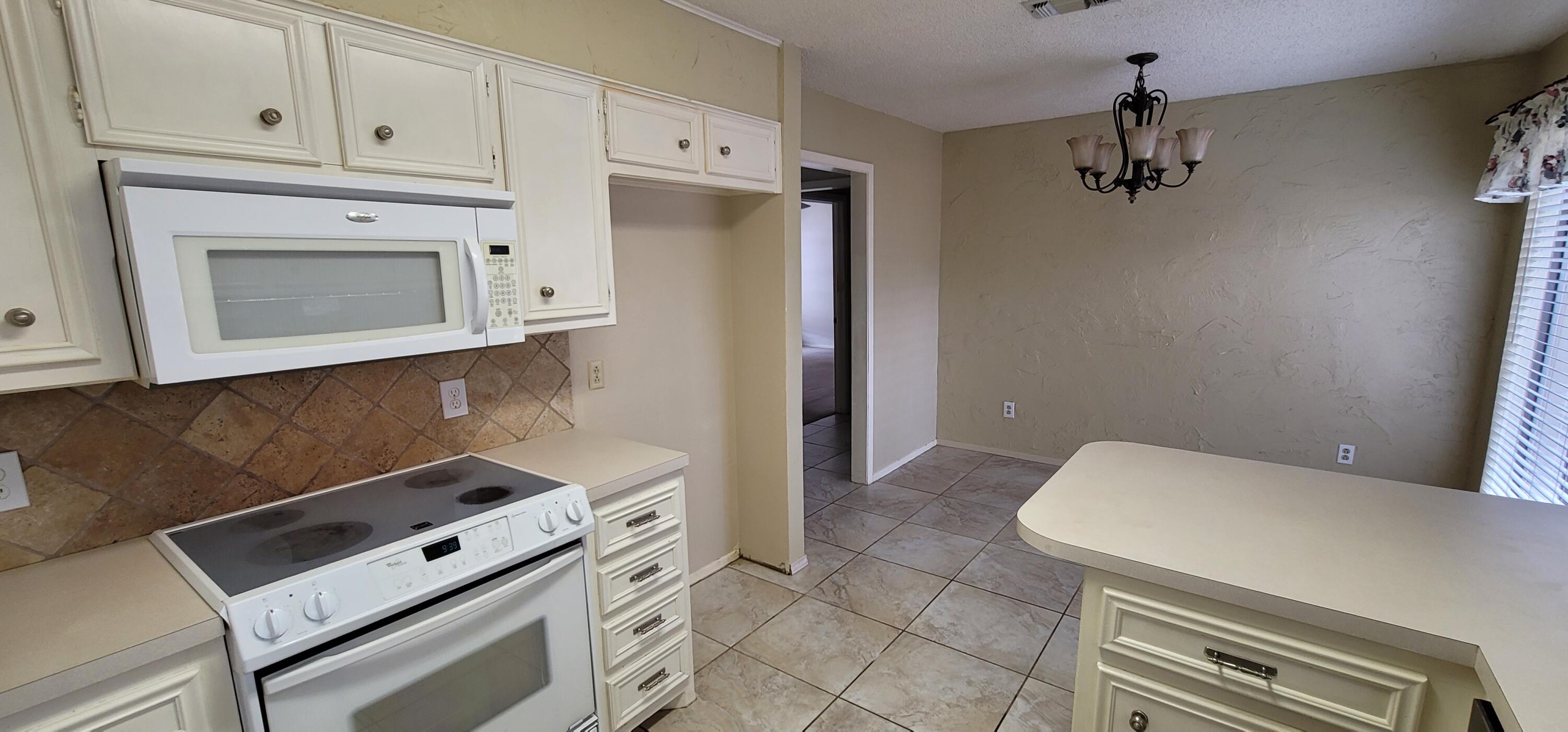 4803 73rd Street Lubbock, TX 79424 - Photo 9 of 32 Space Saver Microwave & Cermic Range