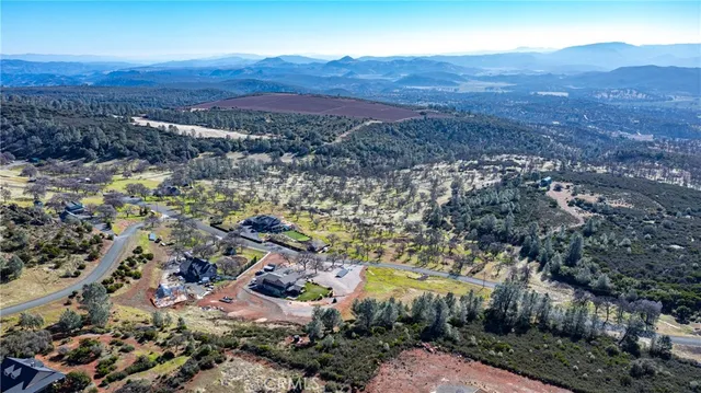 a view of a backyard with mountain and mountain view