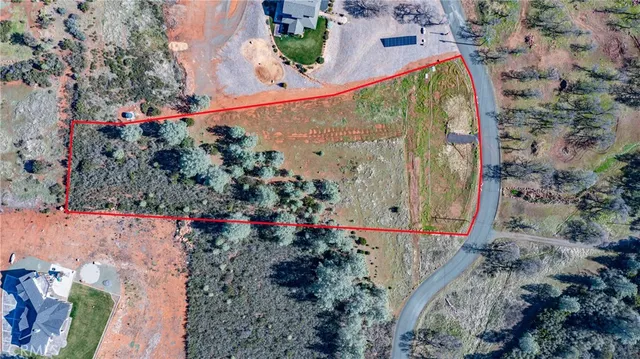 an aerial view of residential house with outdoor space