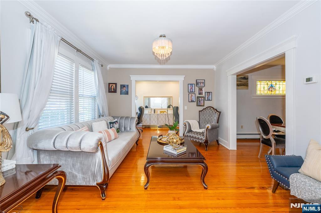690 Garden Street Maywood, NJ 07607 - Photo 6 of 49 a living room with furniture and a window