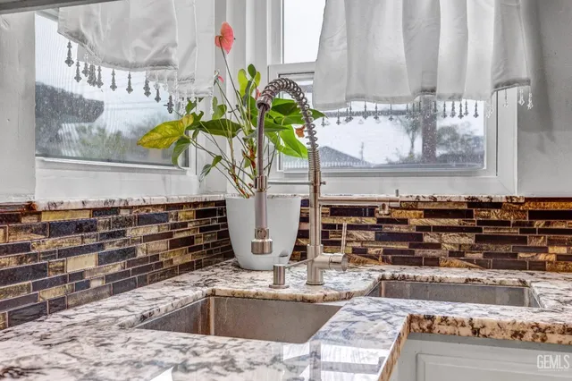 a vase of flowers sitting on a table