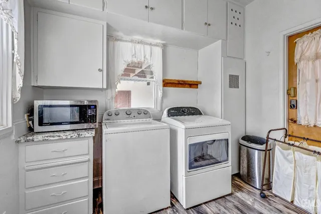 a kitchen with a stove and a microwave