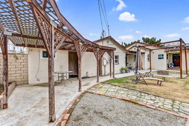 a view of a house with a patio