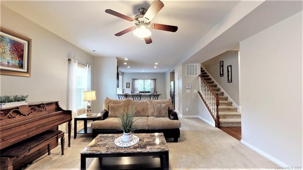 3012 Fallondale Road Waxhaw, NC 28173 - Photo 14 of 47 a living room with furniture and a piano