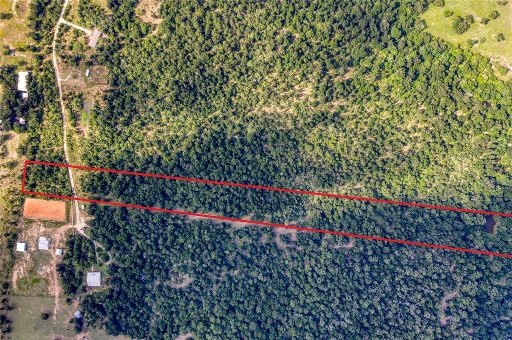 0 Fawn Ridge Road Cedar Creek, TX 78612 - Photo 2 of 3 a view of a flower garden