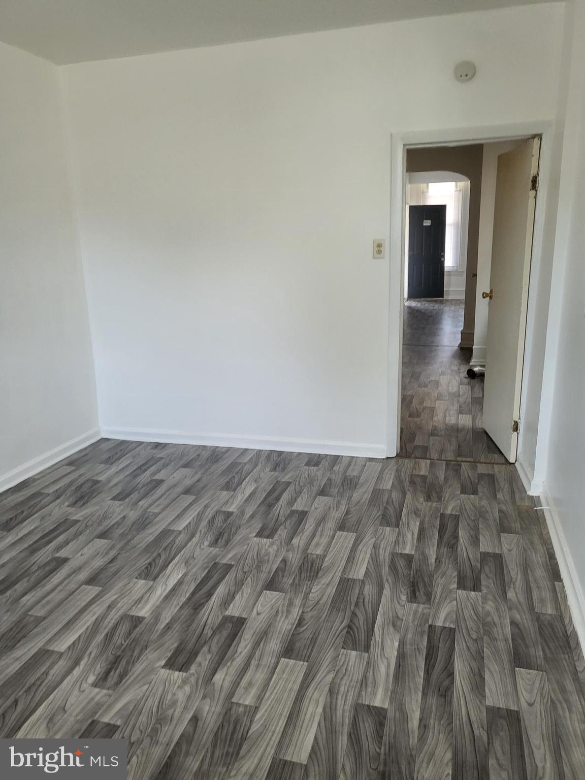 5820 Arch Street, Unit 1 Philadelphia, PA 19139 - Photo 4 of 9 a view of a room with wooden floor