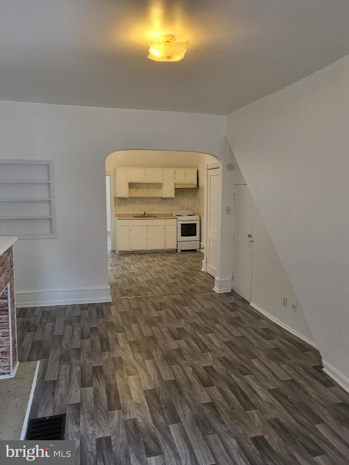 5820 Arch Street, Unit 1 Philadelphia, PA 19139 - Photo 7 of 9 a view of empty room with wooden floor