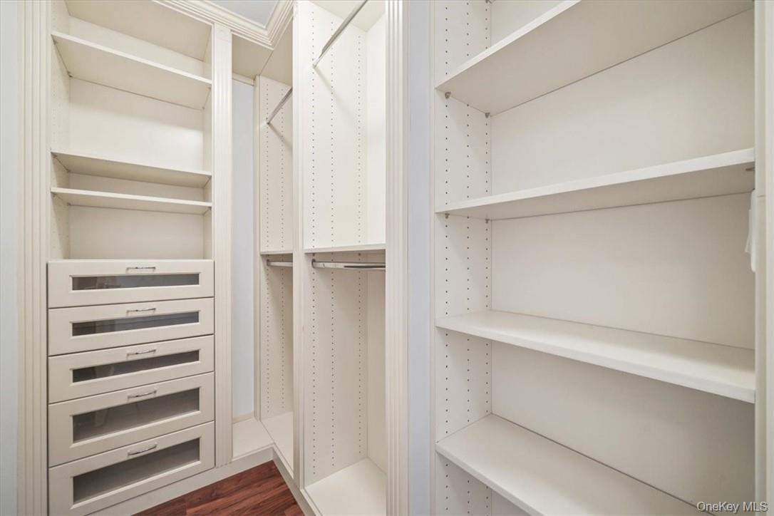 5 Renaissance Square, Unit 21E White Plains, NY 10601 - Photo 24 of 34 a view of walk in closet with empty racks