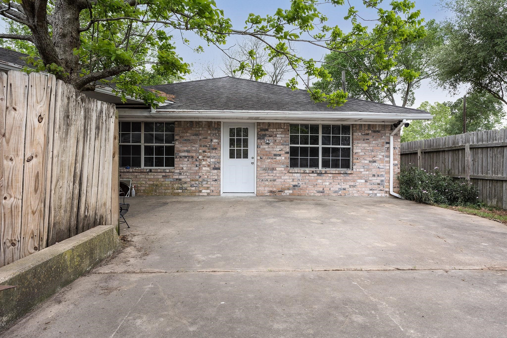 2538 Oday Road, Unit A Pearland, TX 77581 - Photo 8 of 8 a front view of a house with garden