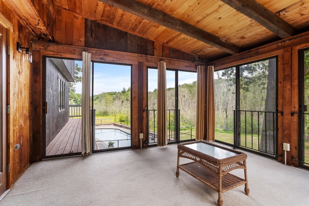 292 Berlin Road Bolton, MA 01740 - Photo 18 of 42 a building outdoor space with seating area and furniture