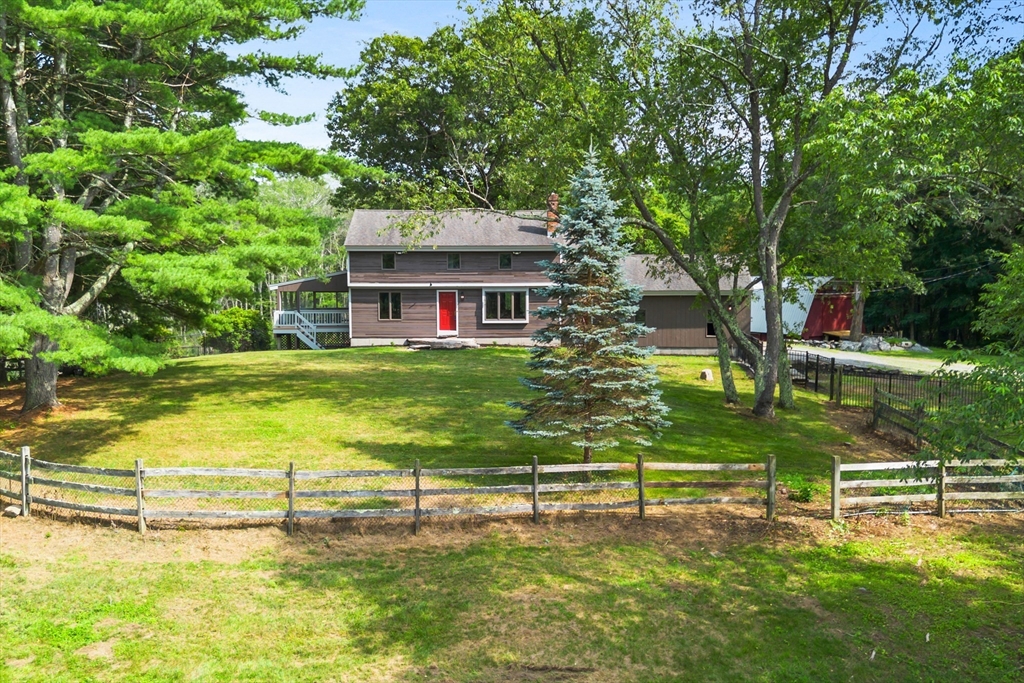 292 Berlin Road Bolton, MA 01740 - Photo 2 of 42 a view of a house with a big yard