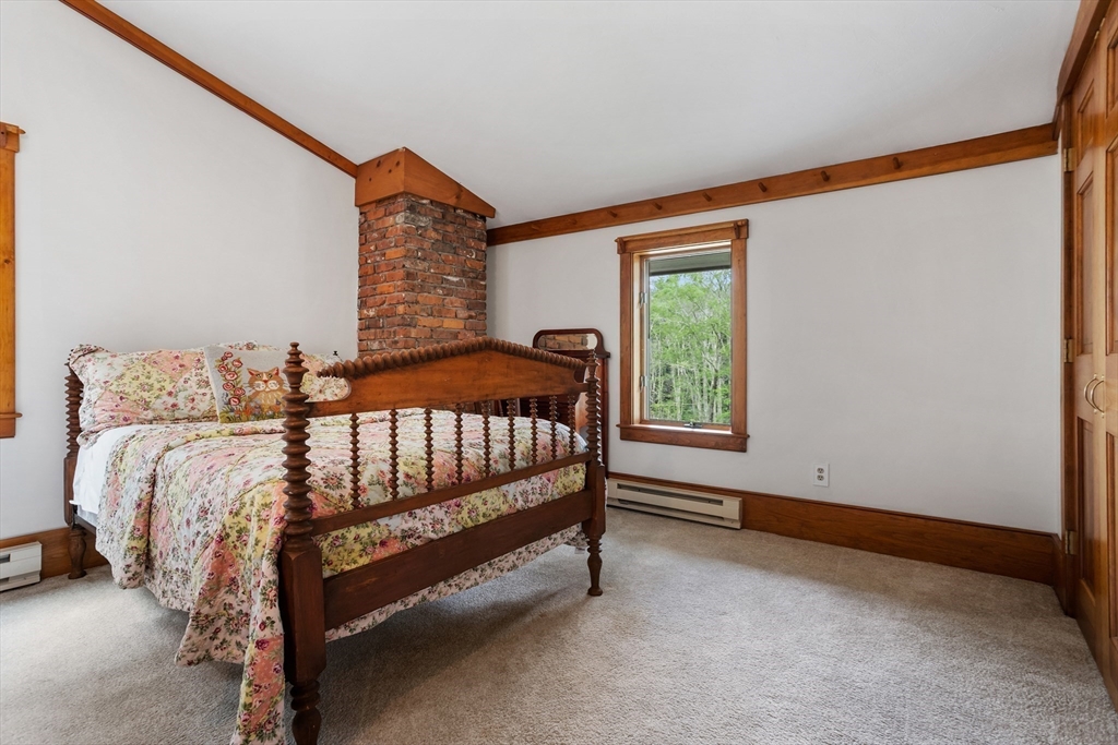 292 Berlin Road Bolton, MA 01740 - Photo 24 of 42 a bedroom with a bed and window