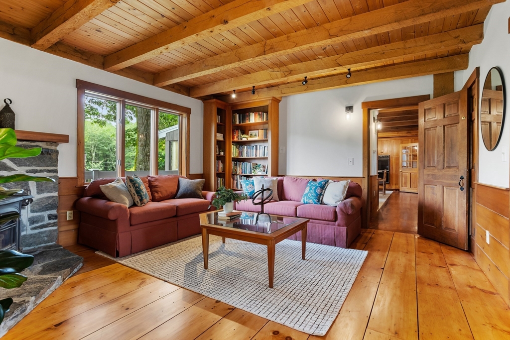 292 Berlin Road Bolton, MA 01740 - Photo 6 of 42 a living room with furniture and a rug