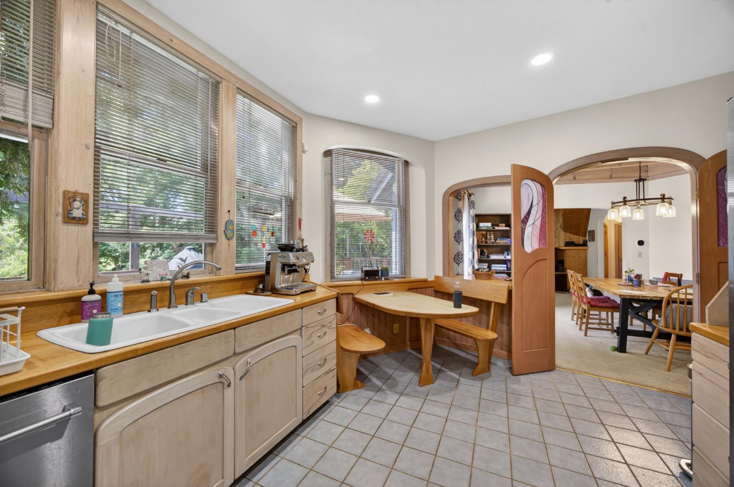 3940 Bannister Road Fair Oaks, CA 95628 - Photo 12 of 84 a large kitchen with stainless steel appliances a sink and cabinets