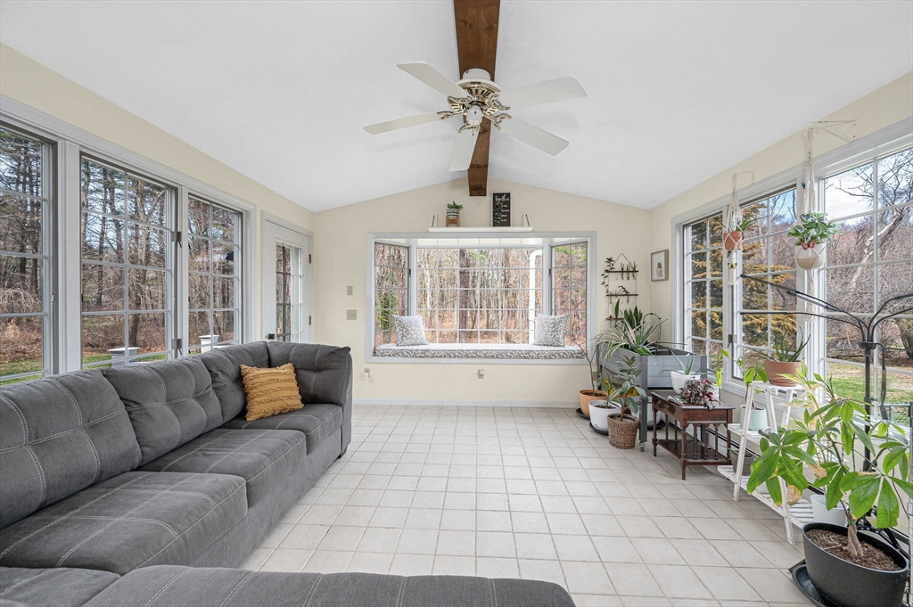16 Old Lowell Road Westford, MA 01886 - Photo 18 of 41 a living room with furniture and a large window