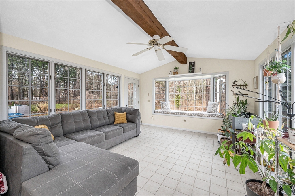 16 Old Lowell Road Westford, MA 01886 - Photo 19 of 41 a living room with furniture and a large window with garden view