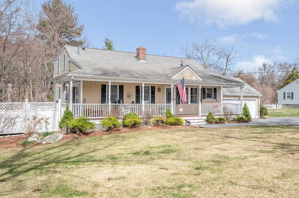 16 Old Lowell Road Westford, MA 01886 - Photo 2 of 41 a front view of a house with a yard