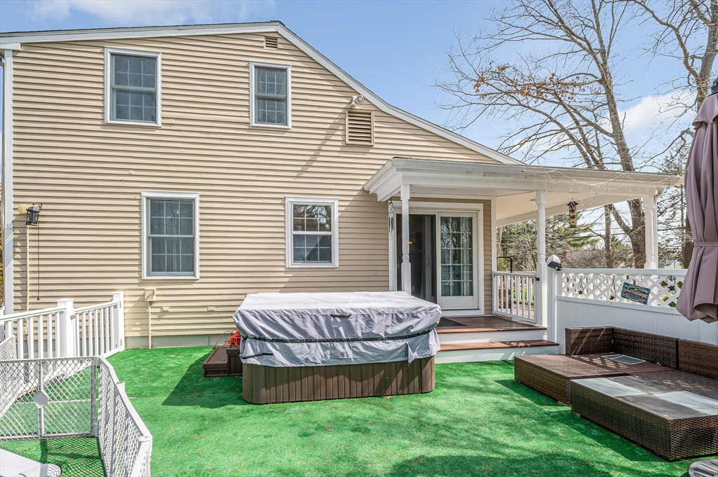16 Old Lowell Road Westford, MA 01886 - Photo 29 of 41 a view of a house with a backyard and a patio