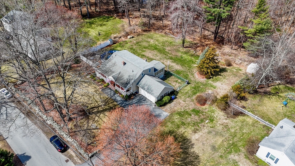 16 Old Lowell Road Westford, MA 01886 - Photo 39 of 41 an aerial view of a house with a yard