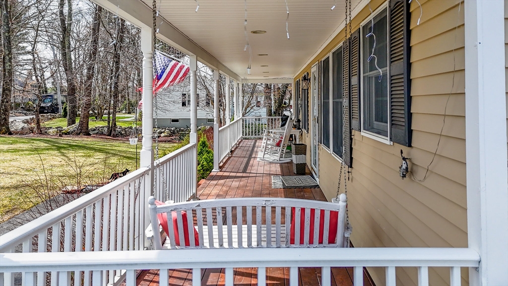 16 Old Lowell Road Westford, MA 01886 - Photo 41 of 41 a view of staircase with white walls and black wooden fence