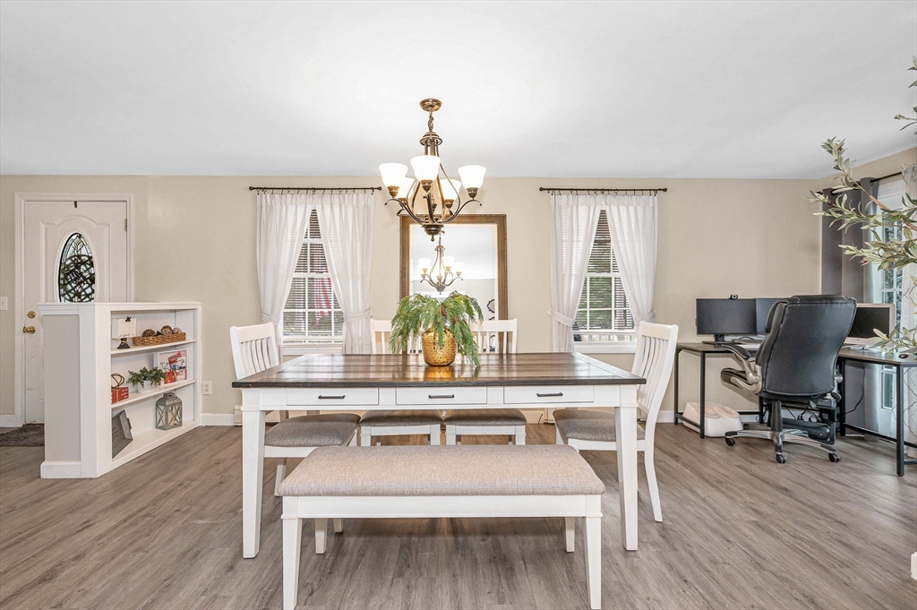 16 Old Lowell Road Westford, MA 01886 - Photo 8 of 41 a view of a dining room with furniture and wooden floor