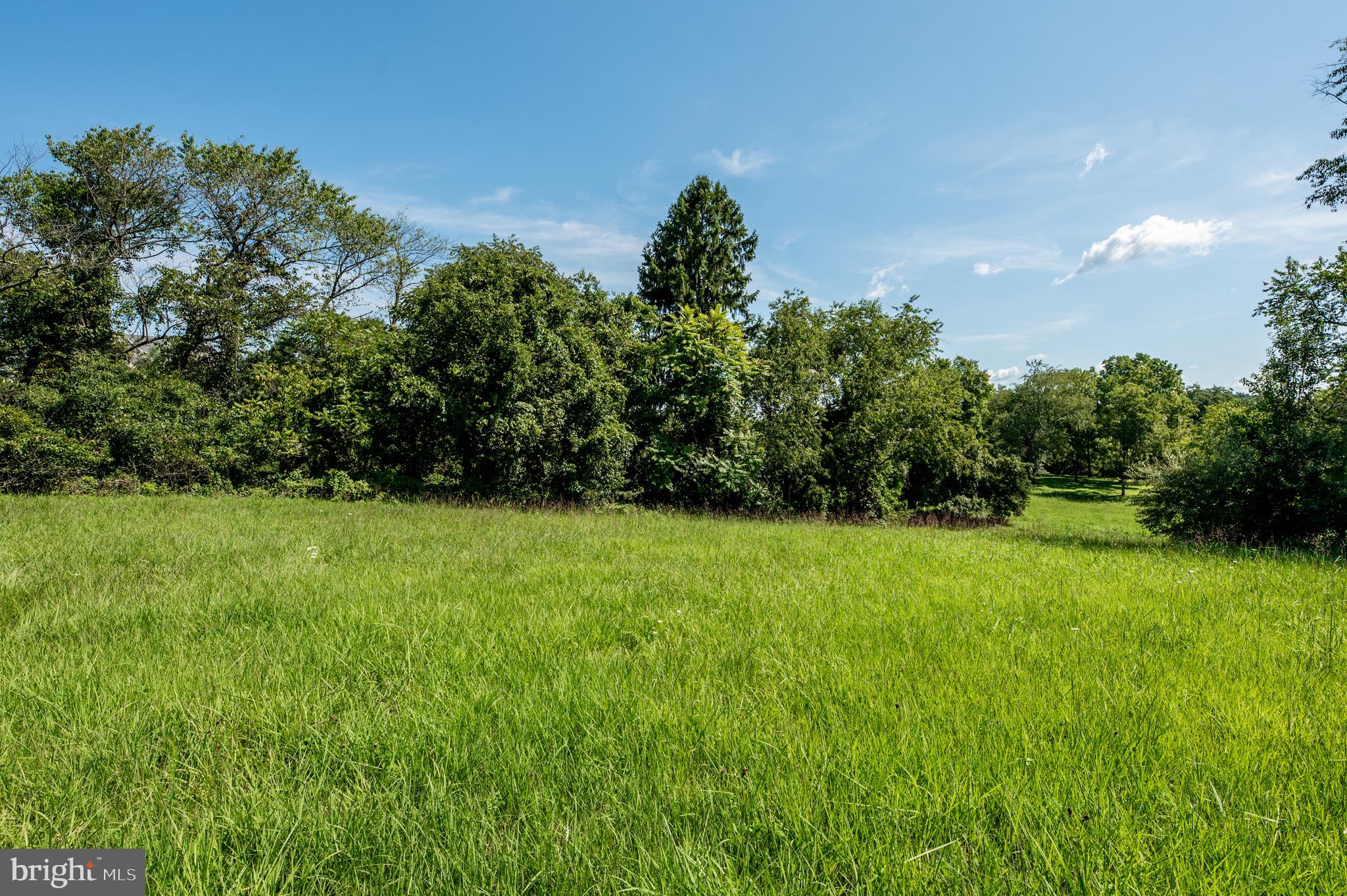 2039-2035 Lenape Unionville Road Kennett Square, PA 19348 - Photo 14 of 19 a view of an outdoor space and a yard