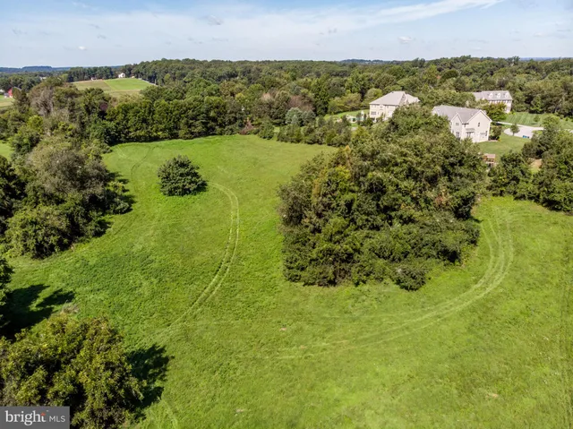 a view of lake with residential houses with outdoor space