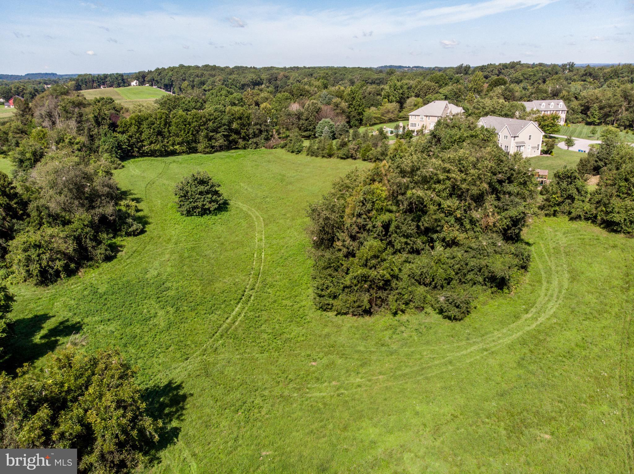 2039-2035 Lenape Unionville Road Kennett Square, PA 19348 - Photo 5 of 19 a view of lake with residential houses with outdoor space