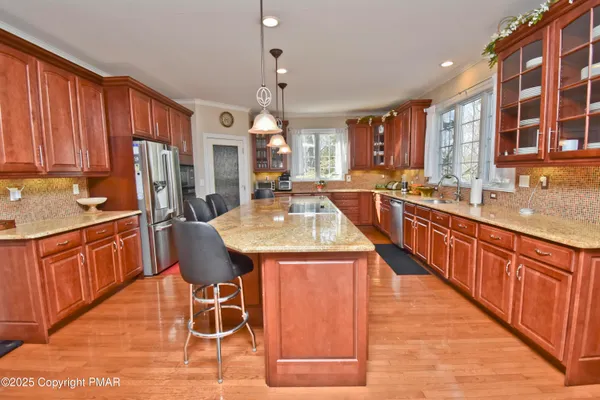 a living room with furniture fireplace and a flat screen tv